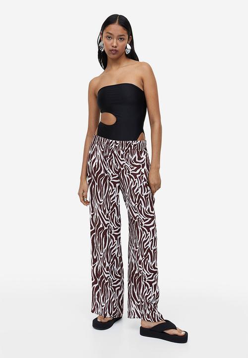 H&M - Crêpe pull-on trousers - dark brown zebra print 