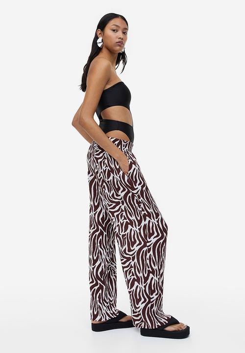 H&M - Crêpe pull-on trousers - dark brown zebra print 