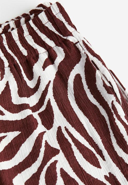 H&M - Crêpe pull-on trousers - dark brown zebra print 