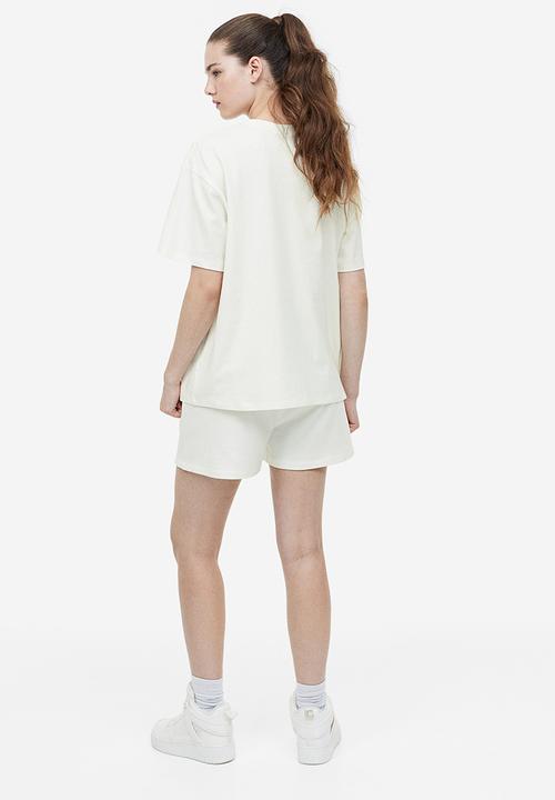 H&M - Oversized printed t-shirt - cream bambi