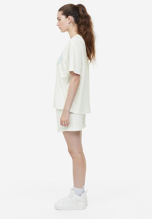 H&M - Oversized printed t-shirt - cream bambi