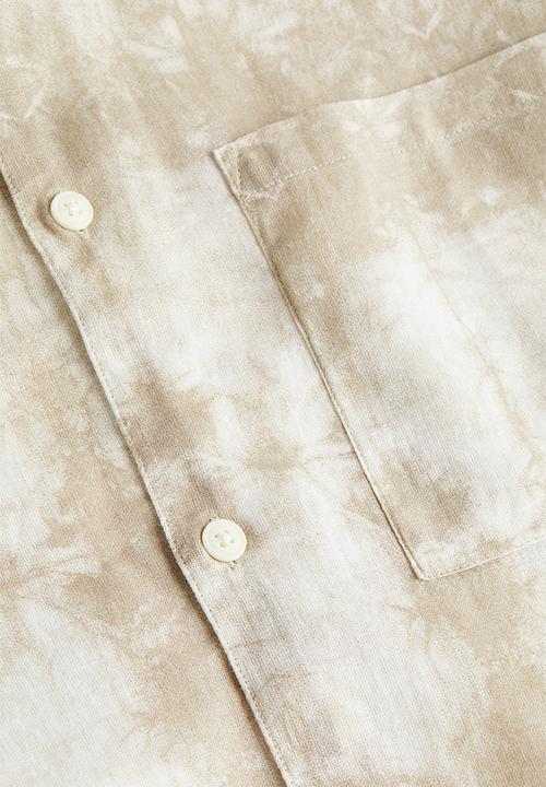 H&M - Relaxed fit short-sleeved linen-blend shirt - beige tie-dye