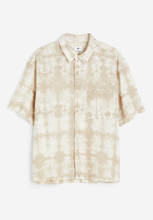 H&M - Relaxed fit short-sleeved linen-blend shirt - beige tie-dye