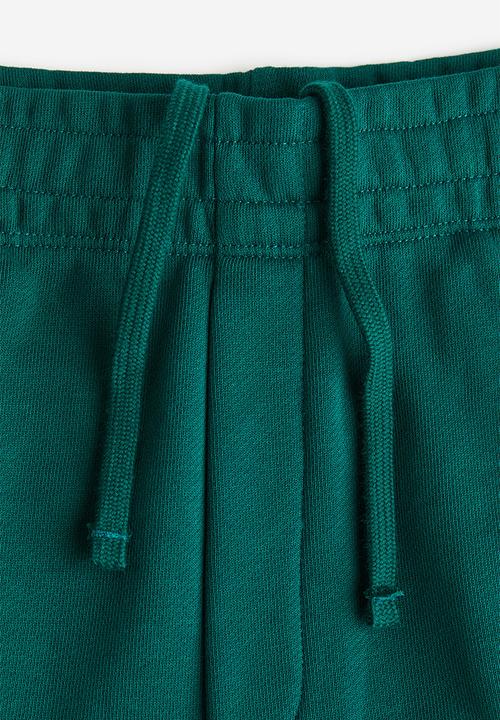 H&M - Relaxed fit printed sweat shorts - dark green snoopy