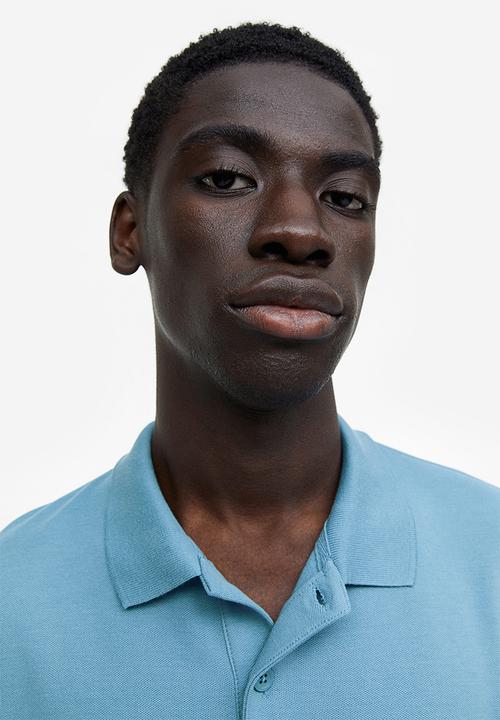 H&M - Coolmax® oversized fit polo shirt - turquoise