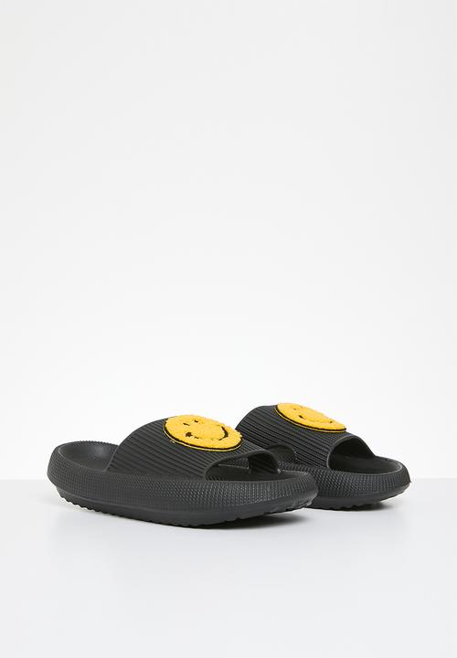 Pop Candy - Smiley face slides - black