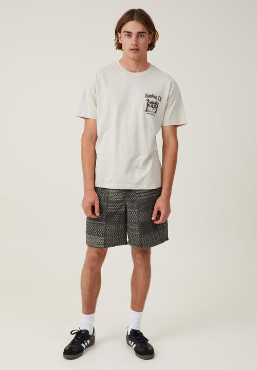 Cotton On - Loose fit graphic T-shirt - ivory/bandera texas