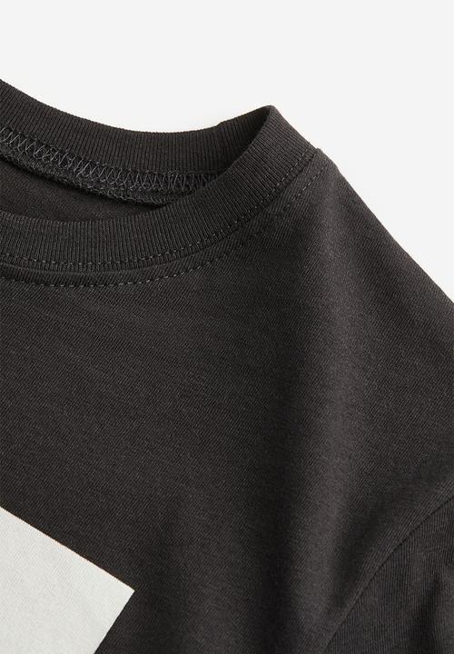 H&M - Printed jersey T-shirt - black refresh restart