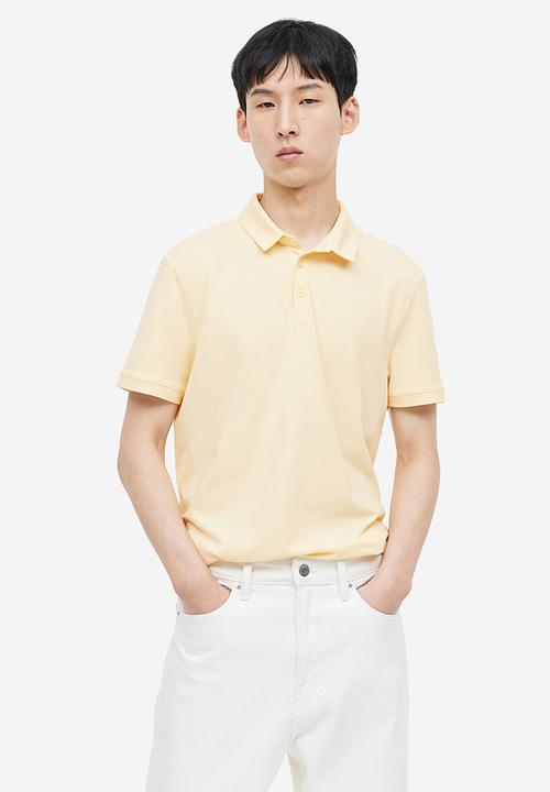 H&M - Coolmax® slim fit polo shirt - light yellow