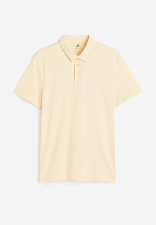 H&M - Coolmax® slim fit polo shirt - light yellow