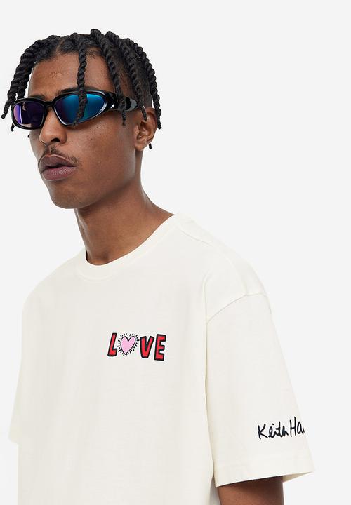 H&M - Relaxed fit t-shirt - cream/keith haring