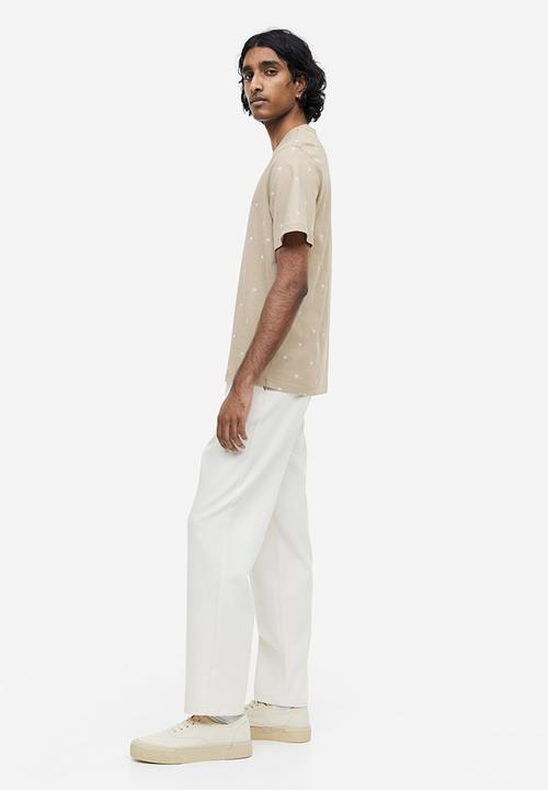 H&M - Regular fit cotton t-shirt - beige/palm trees