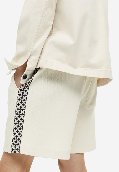 H&M - Relaxed fit jacquard-weave shorts - cream