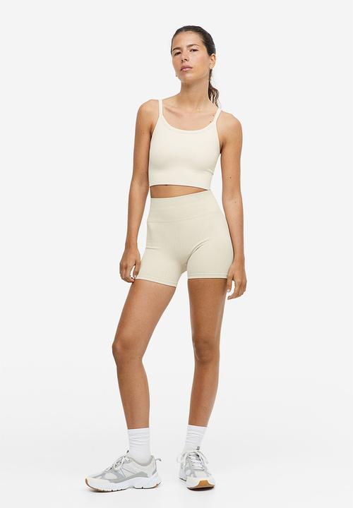 H&M - Drymove™ light support sports bra - light beige 