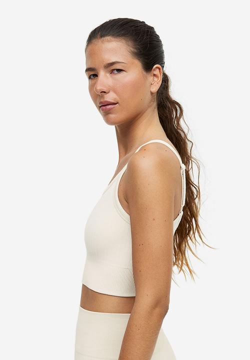 H&M - Drymove™ light support sports bra - light beige 