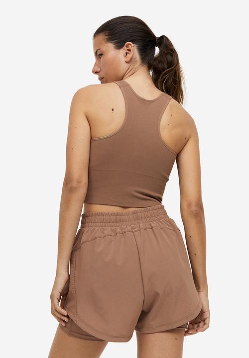 H&M - Drymove™ double-layered running shorts - light brown