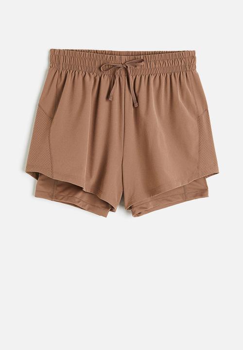 H&M - Drymove™ double-layered running shorts - light brown