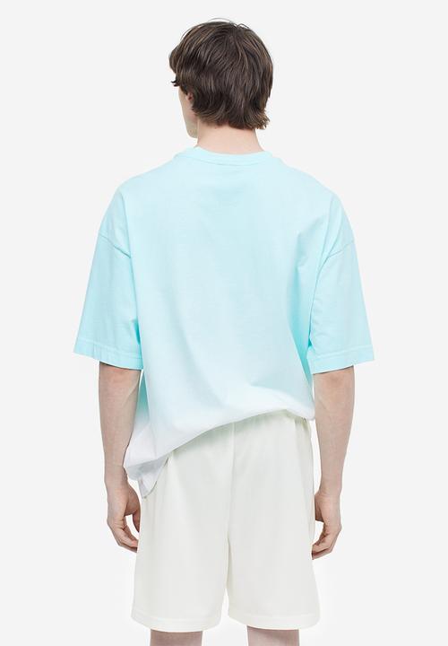 H&M - Relaxed fit mesh shorts - white