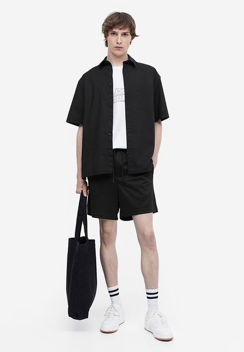 H&M - Relaxed fit mesh shorts - black