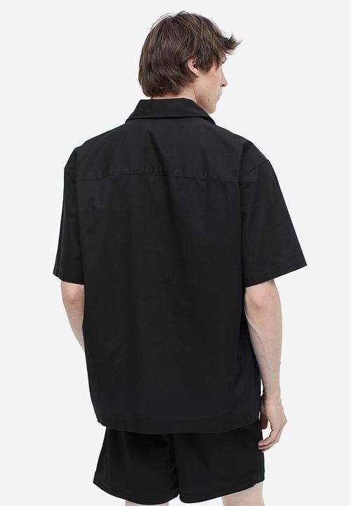 H&M - Relaxed fit mesh shorts - black