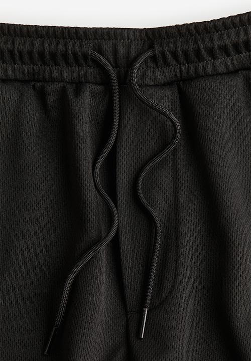 H&M - Relaxed fit mesh shorts - black