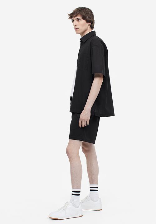 H&M - Relaxed fit mesh shorts - black