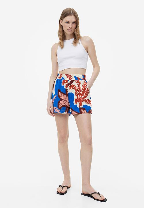 H&M - Crinkled cotton shorts - blue palm trees