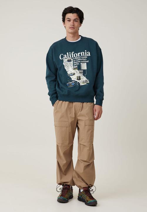 Cotton On - Oversized graphic sweater - deep sea teal / california 