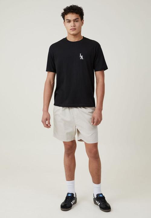 Cotton On - Loose fit graphic t-shirt - black / la monogram 