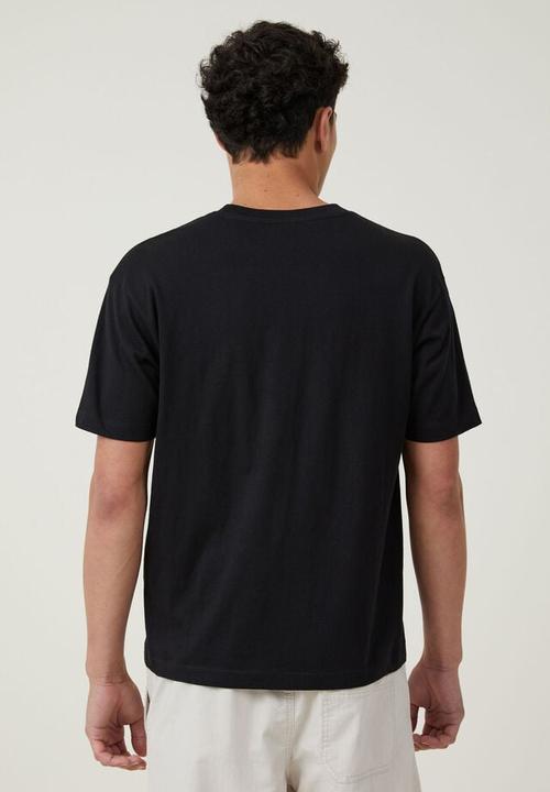 Cotton On - Loose fit graphic t-shirt - black / la monogram 