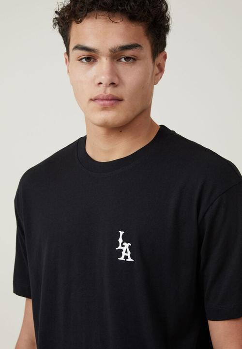 Cotton On - Loose fit graphic t-shirt - black / la monogram 