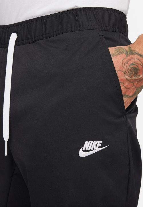 Nike - Club woven tapered leg  pants - black/white