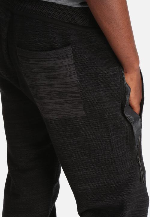 Nike - Tech Knit Libero Pant