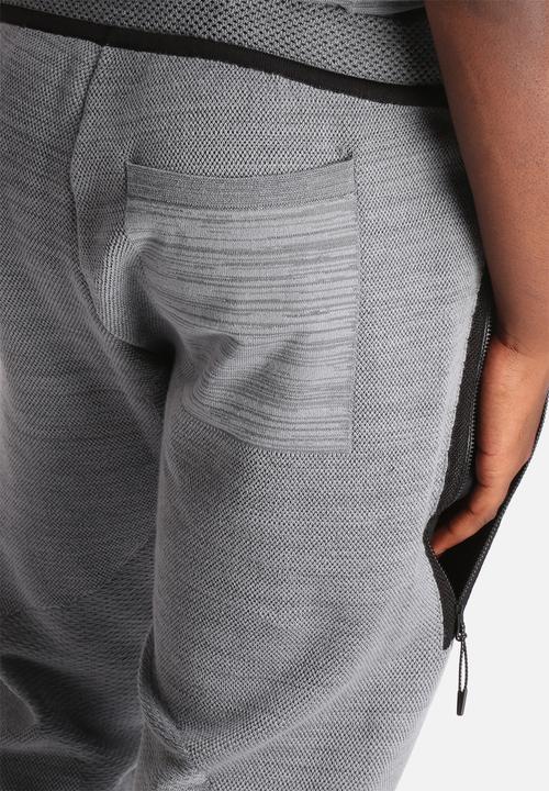 Nike - Tech Knit Libero Pant