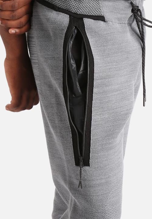 Nike - Tech Knit Libero Pant