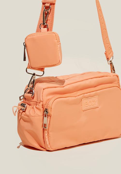 Rubi - Active essential crossbody bag - peachy dream