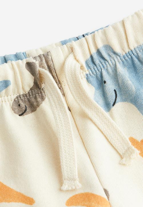 H&M - Cotton joggers - light beige dinosaurs