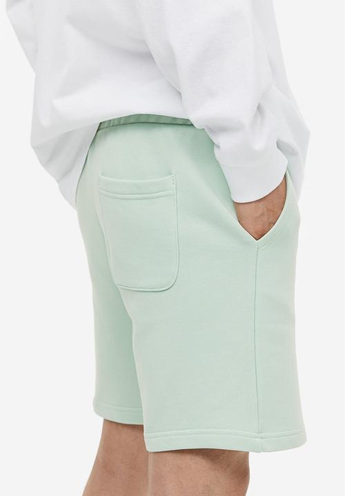 H&M - Regular fit sweatshorts - green