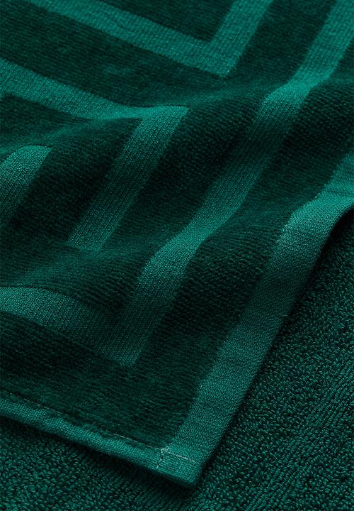 H&M - Burnout-patterned guest towel - dark green/patterned