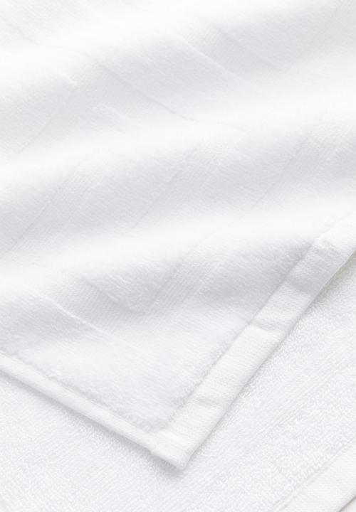 H&M - Burnout-patterned guest towel - white