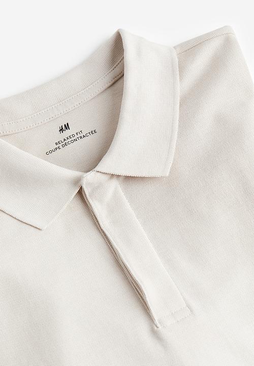 H&M - Relaxed fit piqué polo shirt - light beige 