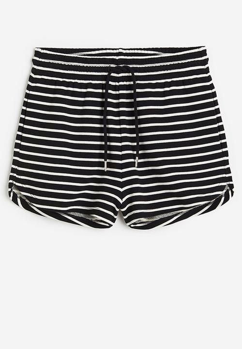 H&M - Sweatshirt shorts - black/white striped