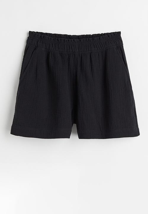H&M - Crinkled cotton shorts - black
