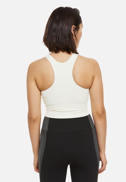 H&M - Drymove™ medium support sports bra - cream