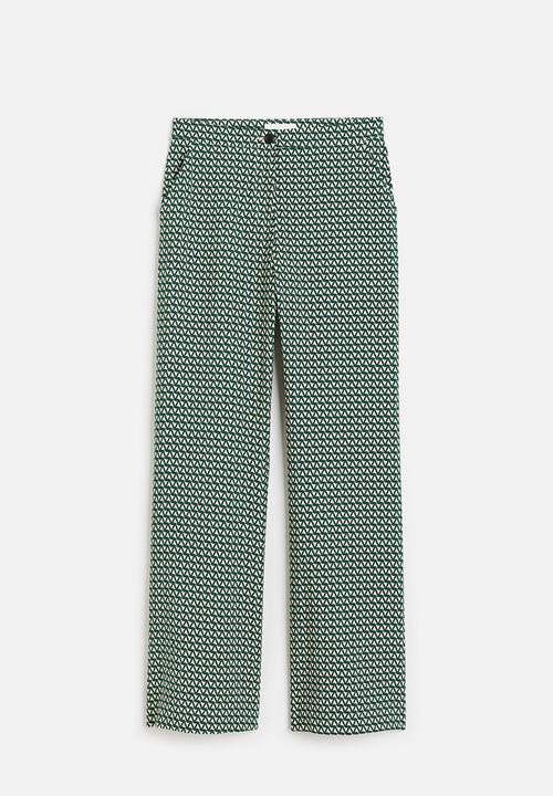 H&M - Flared trousers - dark green & patterned