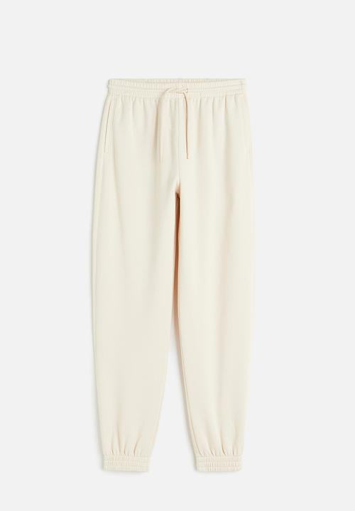 H&M - High-waisted joggers - beige