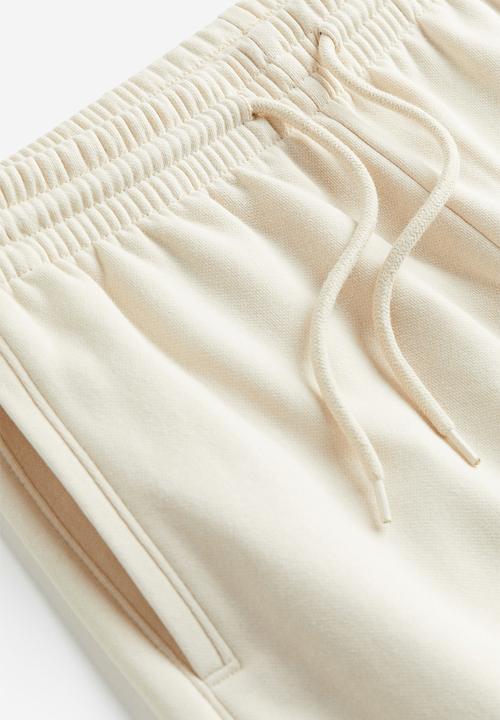 H&M - High-waisted joggers - beige