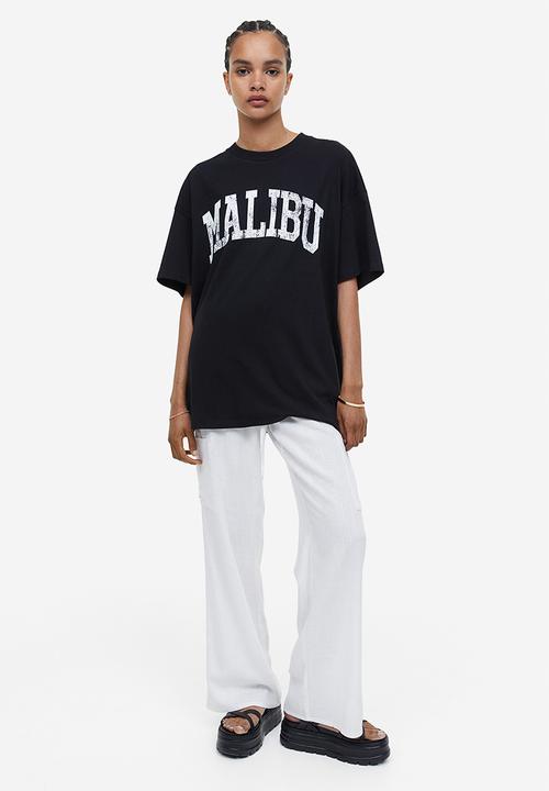 H&M - Oversized printed T-shirt - black malibu 