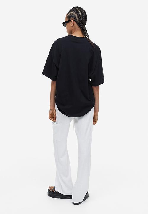 H&M - Oversized printed T-shirt - black malibu 