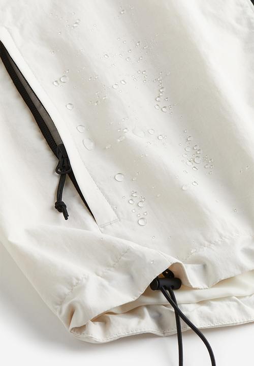 H&M - Regular fit windbreaker - beige/white